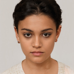 Neutral latino young-adult female with short  brown hair and brown eyes