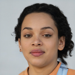 Neutral black young-adult female with medium  brown hair and brown eyes