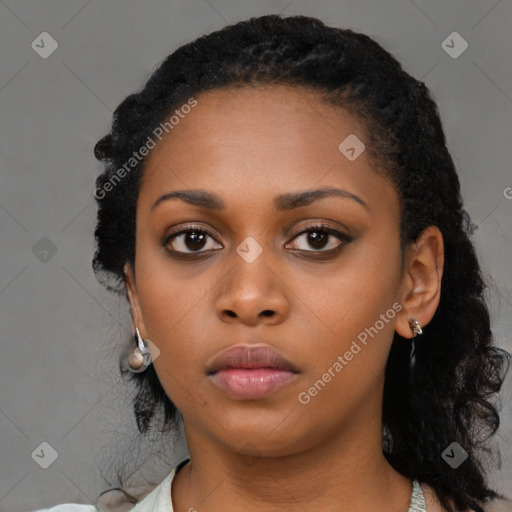 Neutral black young-adult female with medium  black hair and brown eyes