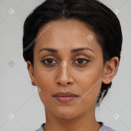 Neutral black young-adult female with short  brown hair and brown eyes