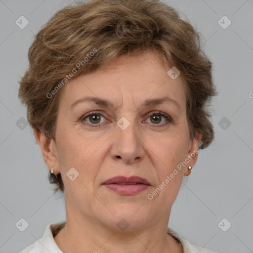 Joyful white adult female with short  brown hair and grey eyes