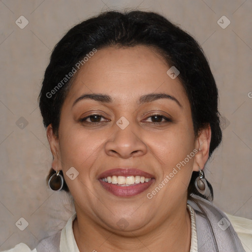 Joyful latino adult female with medium  brown hair and brown eyes