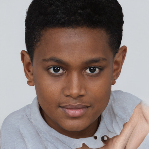 Joyful black young-adult male with short  brown hair and brown eyes