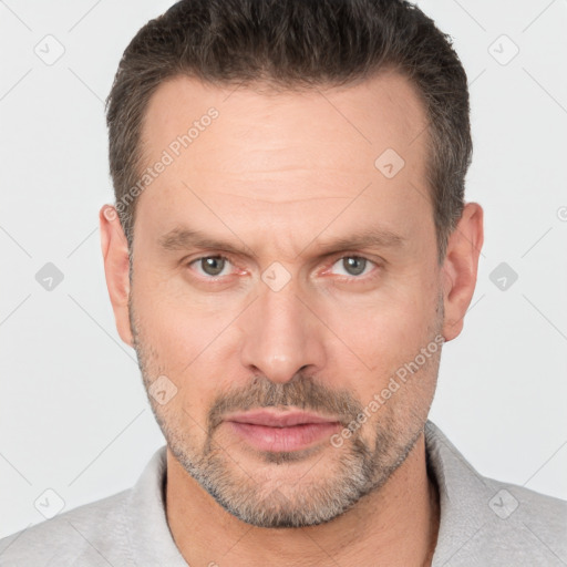 Neutral white adult male with short  brown hair and brown eyes