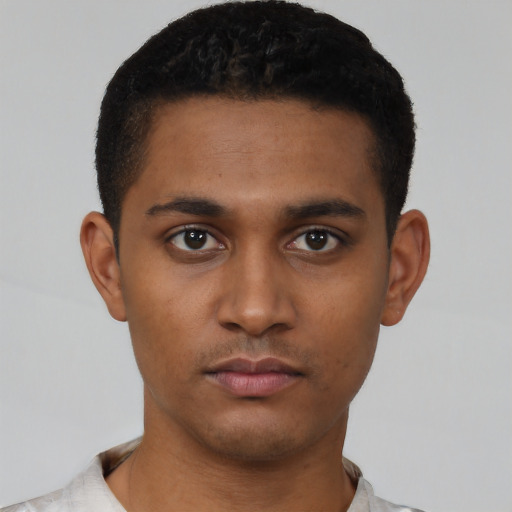 Neutral latino young-adult male with short  brown hair and brown eyes