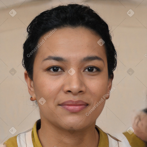 Joyful latino young-adult female with short  black hair and brown eyes