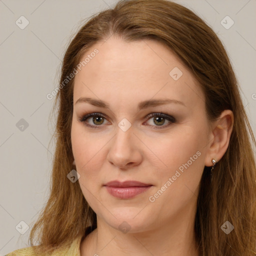 Joyful white young-adult female with long  brown hair and brown eyes