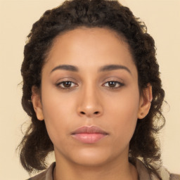 Neutral latino young-adult female with long  brown hair and brown eyes