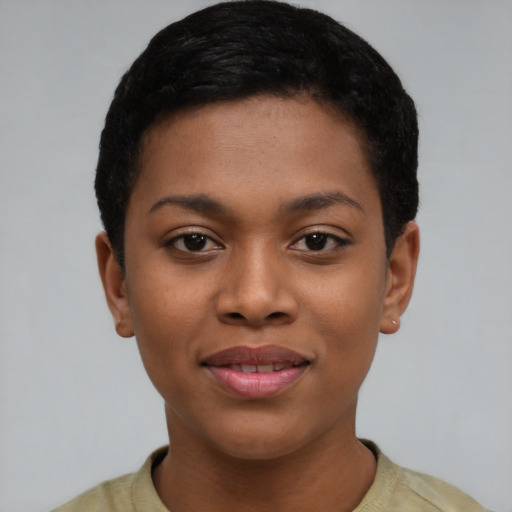 Joyful black young-adult female with short  black hair and brown eyes