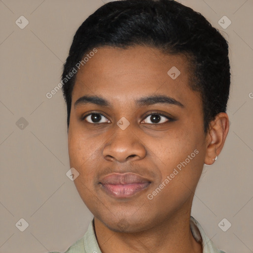 Joyful black young-adult male with short  black hair and brown eyes