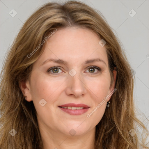 Joyful white adult female with long  brown hair and brown eyes