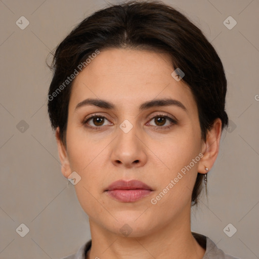 Neutral white young-adult female with short  brown hair and brown eyes