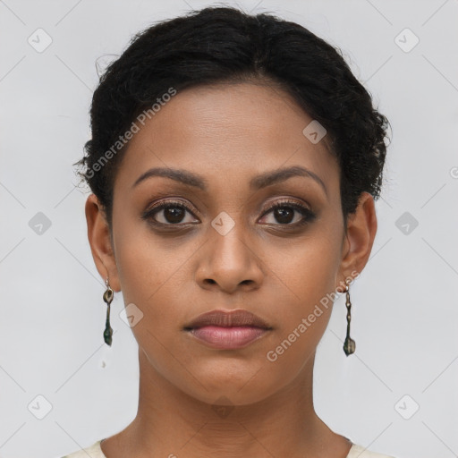 Joyful latino young-adult female with short  brown hair and brown eyes