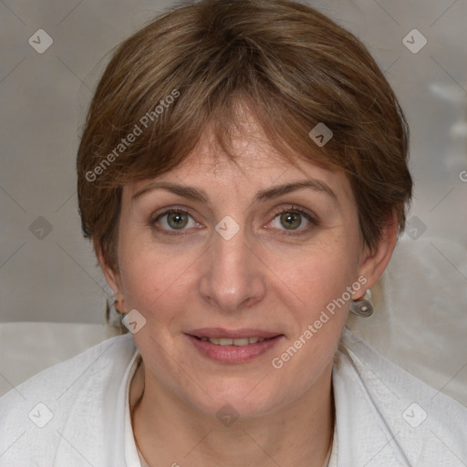 Joyful white adult female with medium  brown hair and blue eyes