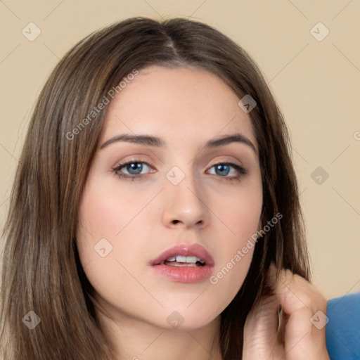 Neutral white young-adult female with long  brown hair and brown eyes