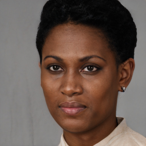 Neutral black young-adult female with short  black hair and brown eyes