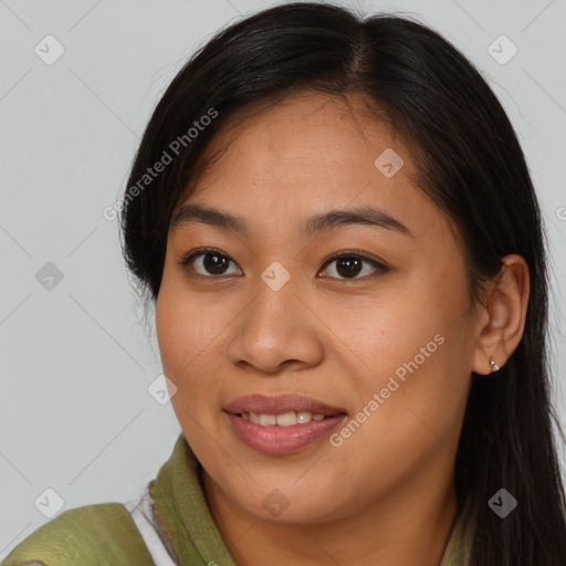 Joyful asian young-adult female with long  brown hair and brown eyes