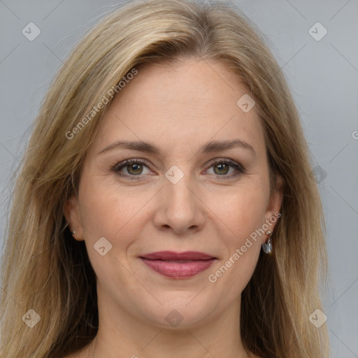 Joyful white adult female with long  brown hair and brown eyes