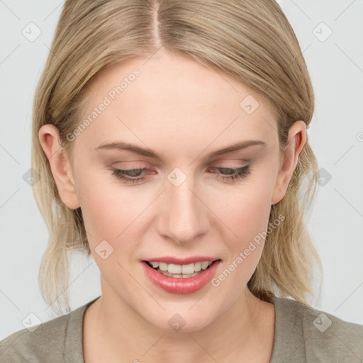 Joyful white young-adult female with medium  brown hair and blue eyes