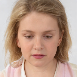 Neutral white child female with medium  brown hair and blue eyes