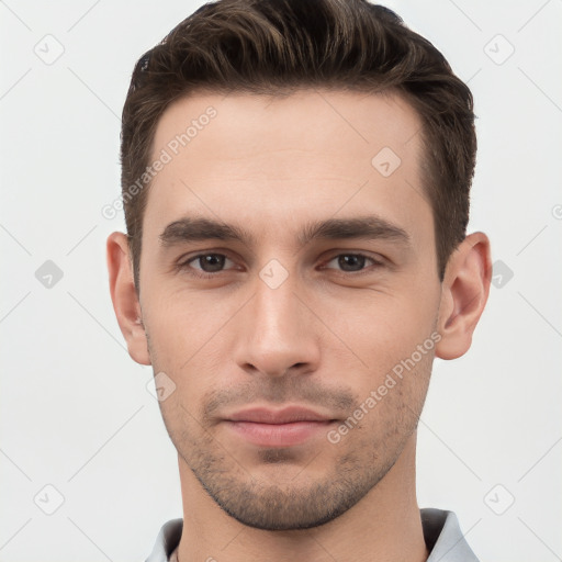 Neutral white young-adult male with short  brown hair and brown eyes