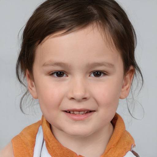 Joyful white child female with medium  brown hair and brown eyes