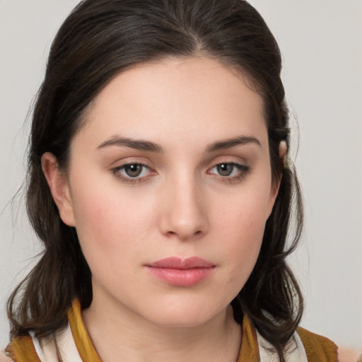 Neutral white young-adult female with medium  brown hair and brown eyes