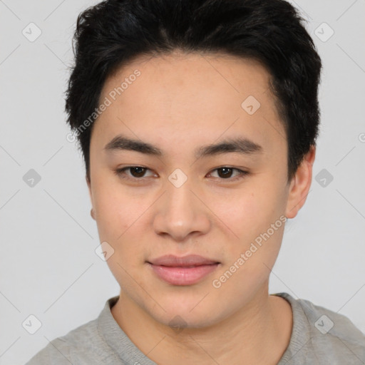 Joyful asian young-adult male with short  black hair and brown eyes