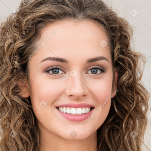 Joyful white young-adult female with long  brown hair and green eyes