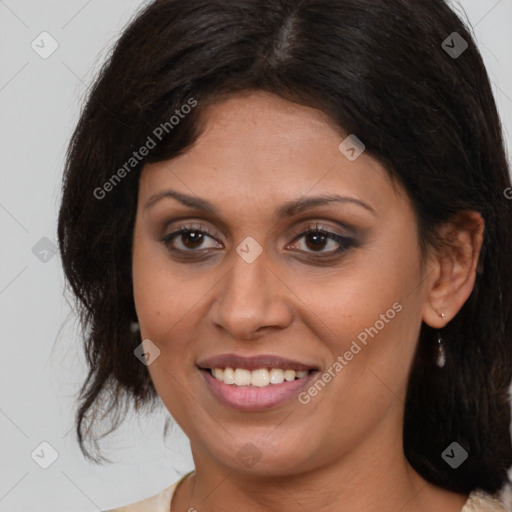 Joyful latino young-adult female with medium  brown hair and brown eyes