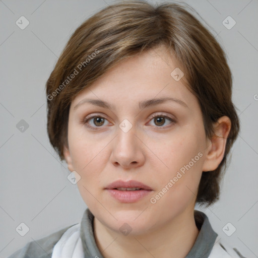 Neutral white young-adult female with medium  brown hair and brown eyes