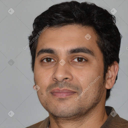 Neutral white young-adult male with short  black hair and brown eyes