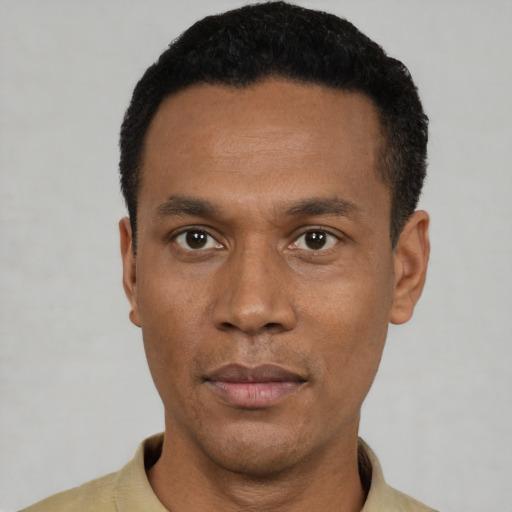 Neutral black young-adult male with short  black hair and brown eyes