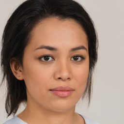 Neutral asian young-adult female with medium  brown hair and brown eyes