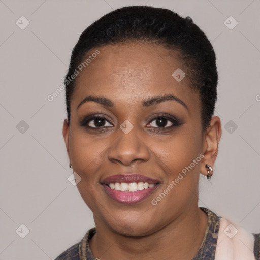 Joyful latino young-adult female with short  black hair and brown eyes