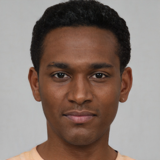 Neutral black young-adult male with short  black hair and brown eyes