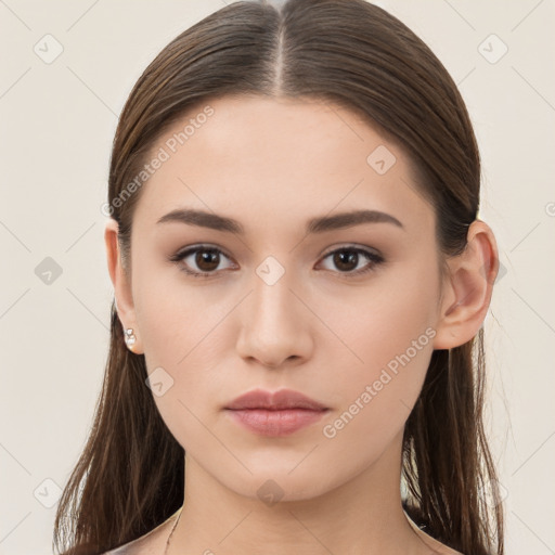 Neutral white young-adult female with long  brown hair and brown eyes