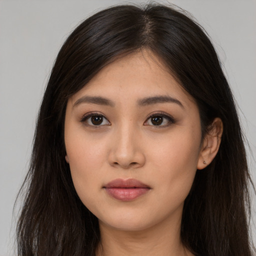 Neutral asian young-adult female with long  brown hair and brown eyes