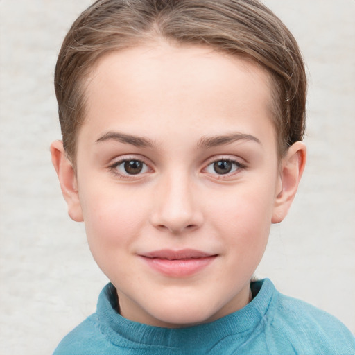 Joyful white child female with short  brown hair and blue eyes