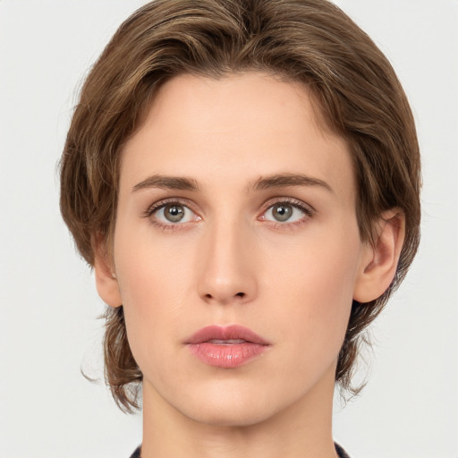 Neutral white young-adult female with medium  brown hair and green eyes