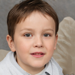 Joyful white child female with short  brown hair and brown eyes