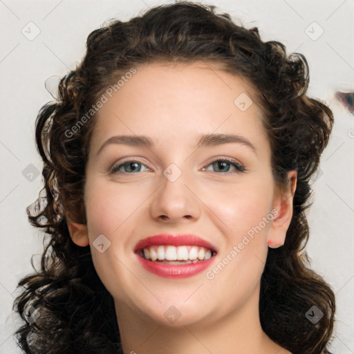 Joyful white young-adult female with long  brown hair and green eyes