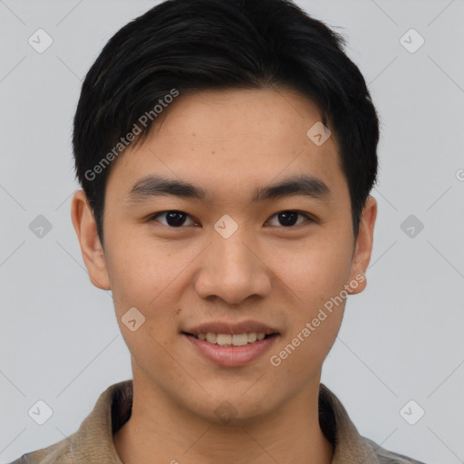 Joyful asian young-adult male with short  black hair and brown eyes