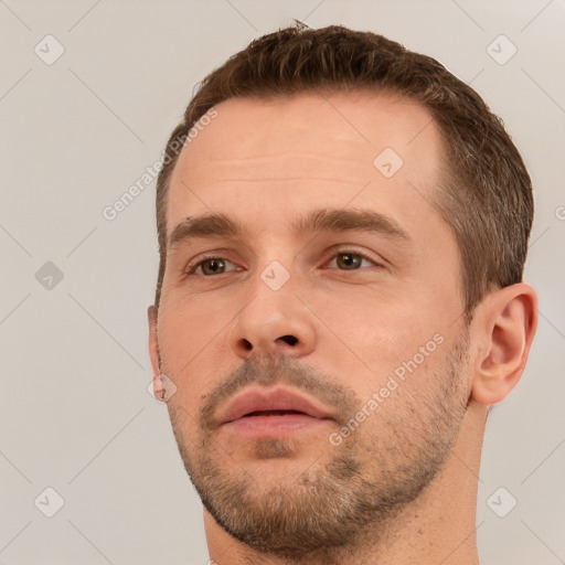 Neutral white young-adult male with short  brown hair and brown eyes