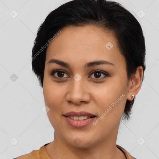 Joyful latino young-adult female with medium  brown hair and brown eyes