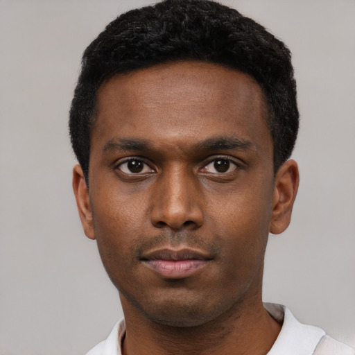 Neutral black young-adult male with short  black hair and brown eyes