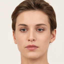 Neutral white young-adult female with short  brown hair and brown eyes