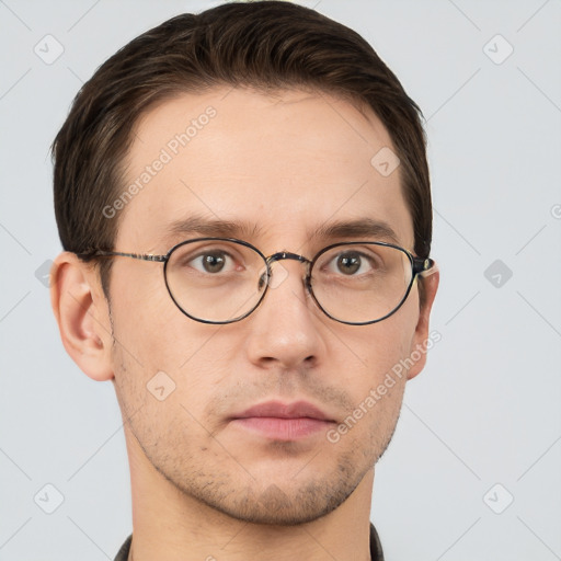 Neutral white young-adult male with short  brown hair and grey eyes