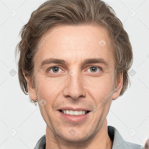 Joyful white adult male with short  brown hair and grey eyes