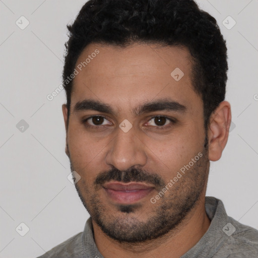 Neutral latino young-adult male with short  black hair and brown eyes